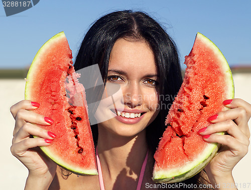 Image of Beautiful girl with water-melon