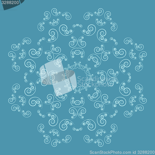 Image of Ornate flower pattern on blue background