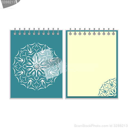 Image of Blue cover notebook with round florwer pattern