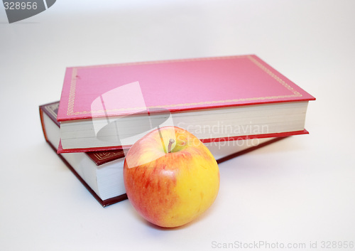 Image of apple and two books