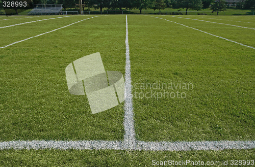 Image of White boundary lines of football playing field