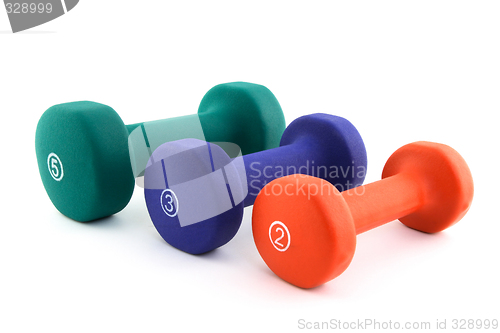 Image of Three colorful dumbbells of different size