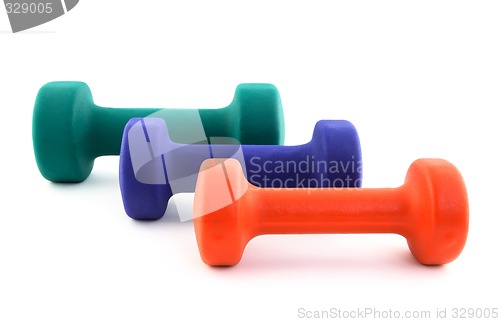 Image of Three dumbbells of different colors