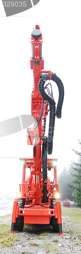 Image of Drilling machine with driller lifted