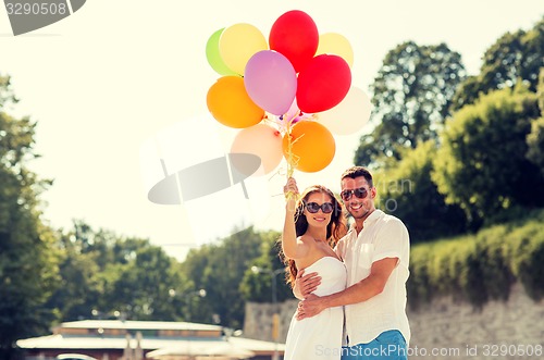 Image of smiling couple in city