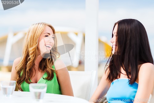 Image of girls in cafe on the beach