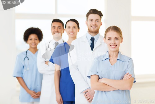 Image of group of doctors and nurses at hospital