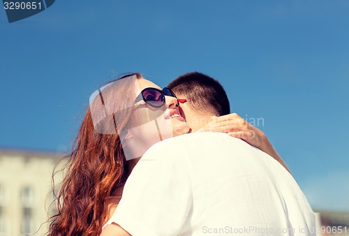 Image of smiling couple in city