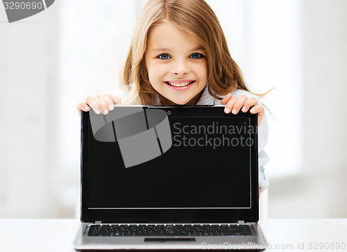 Image of girl with laptop pc at school