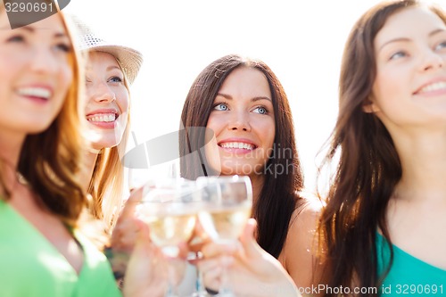 Image of girls with champagne glasses