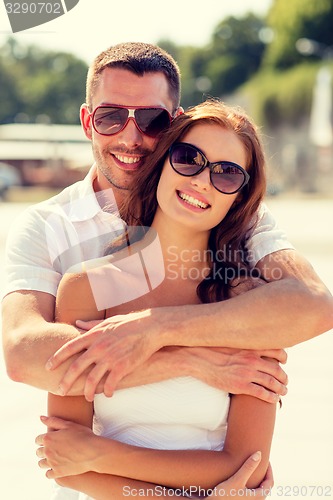 Image of smiling couple in city