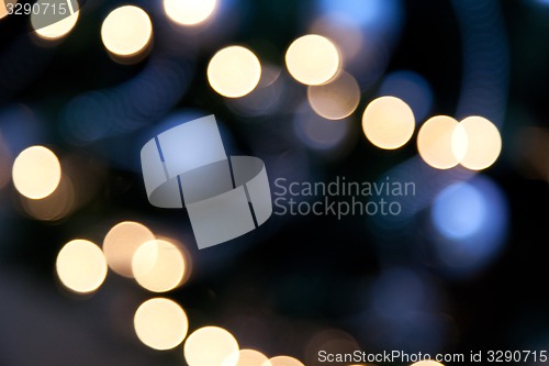Image of bright lights on dark blue night background