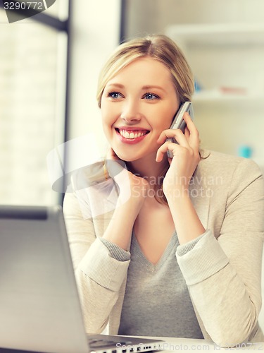 Image of businesswoman with cell phone