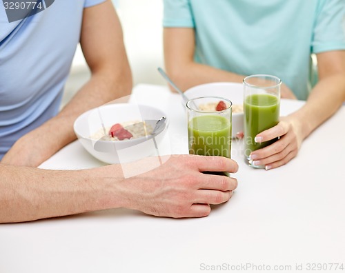 Image of close up of couple having breakfast at home
