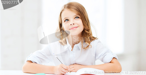 Image of student girl studying at school