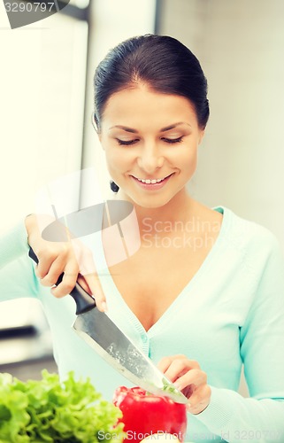 Image of beautiful woman in the kitchen