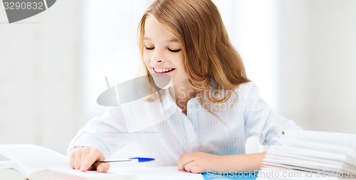 Image of student girl studying at school