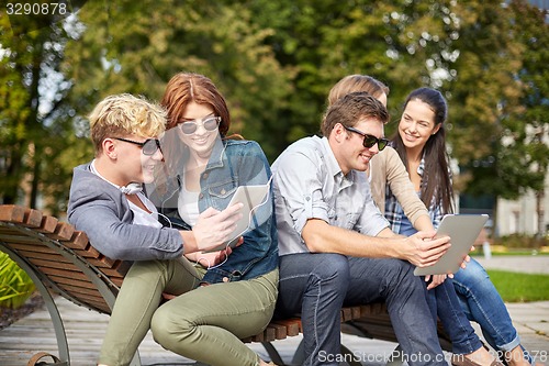Image of students or teenagers with tablet pc taking selfie