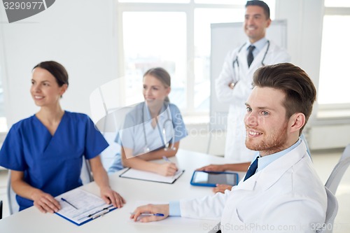 Image of group of doctors on presentation at hospital