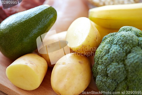 Image of close up of potatoes, broccoli and avocado