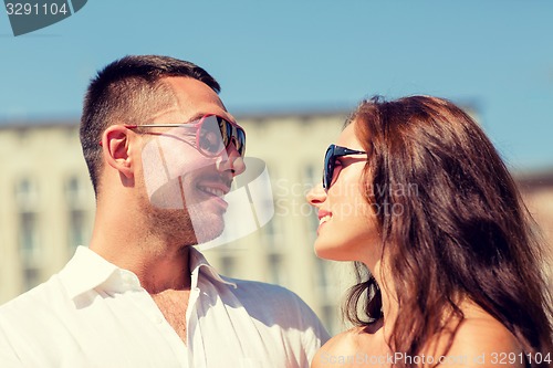 Image of smiling couple in city