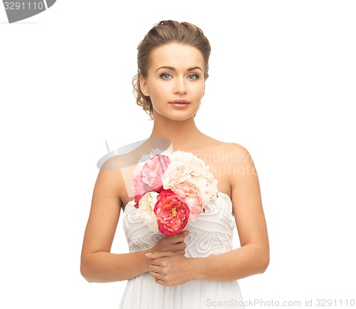 Image of woman with bouquet of flowers