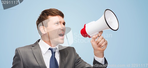 Image of buisnessman with bullhorn or megaphone