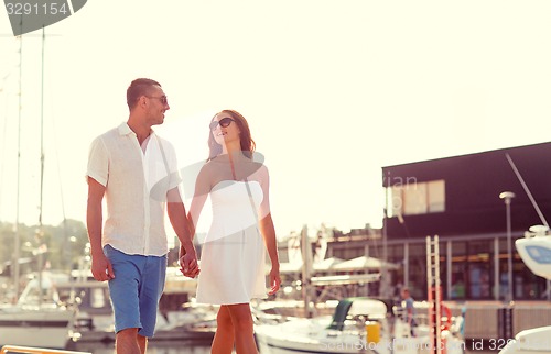 Image of smiling couple in city