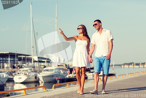 Image of smiling couple in city