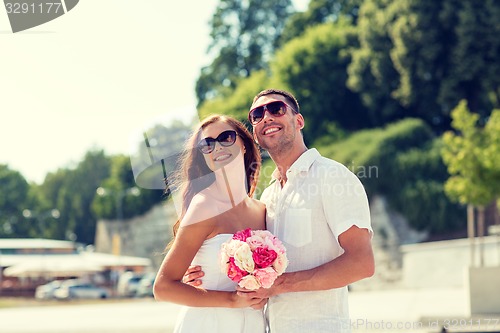 Image of smiling couple in city