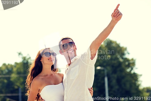 Image of smiling couple in park