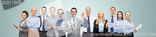 Image of group of happy businesspeople with dollar money