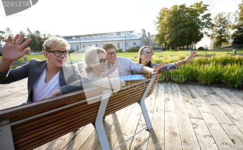 Image of group of students or teenagers hanging out