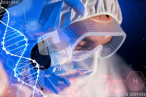 Image of close up of scientist face in chemical lab