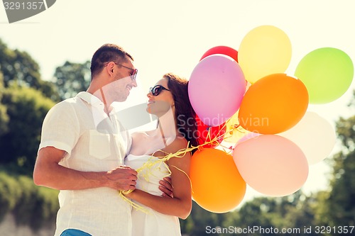 Image of smiling couple in city