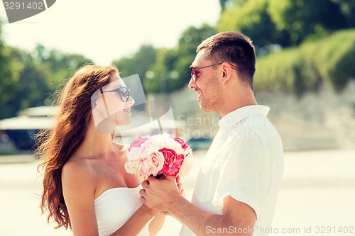 Image of smiling couple in city