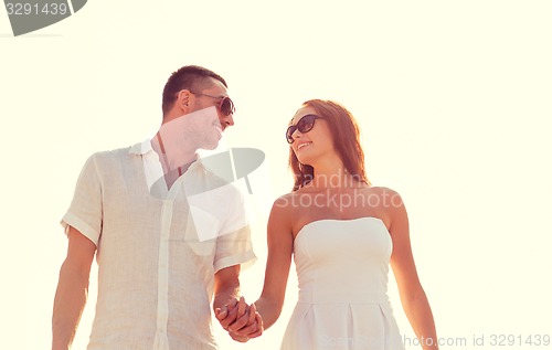 Image of smiling couple in city