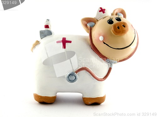 Image of Souvenir - a toy a pig on a white background. isolated 2