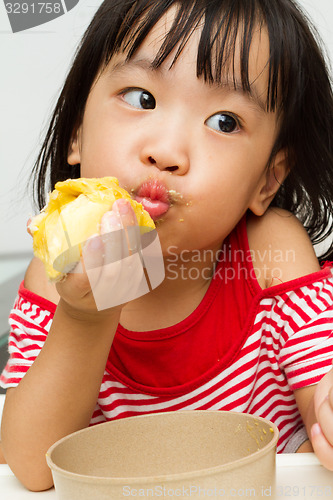 Image of Chinese Girl Eating Durian