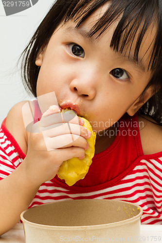 Image of Chinese Girl Eating Durian