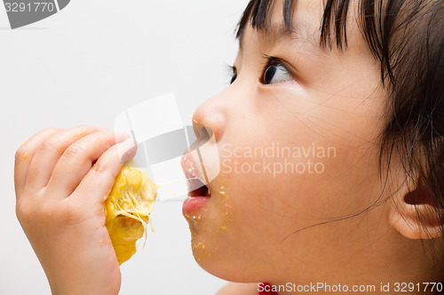 Image of Chinese Girl Eating Durian