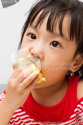 Image of Chinese Girl Eating Durian