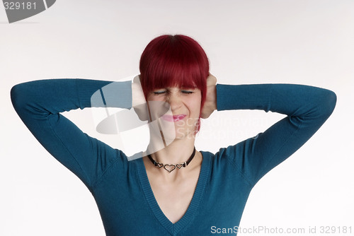 Image of  Woman keeps ear closed