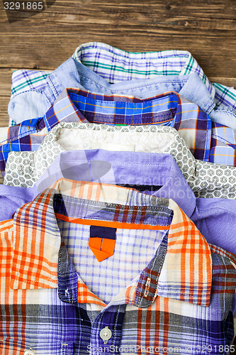 Image of shirts in stack