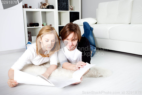 Image of young couple planning