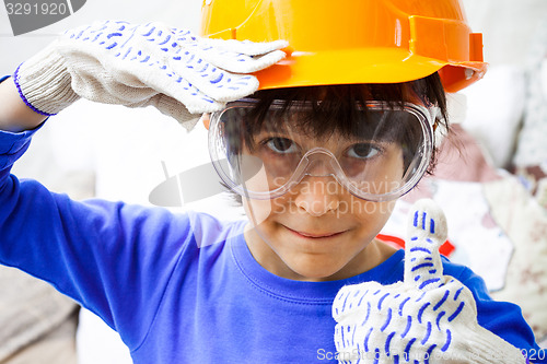 Image of boy in the orange helmet