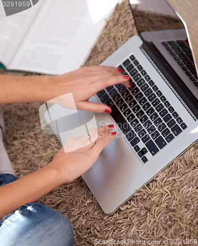 Image of Female hands on a keyboard