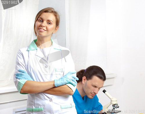 Image of beautiful scientist in the laboratory