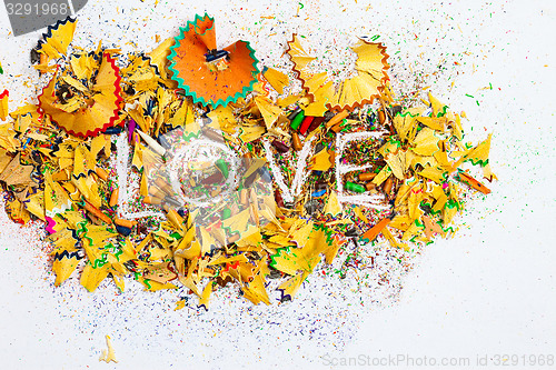 Image of word Love over a shavings of pencils