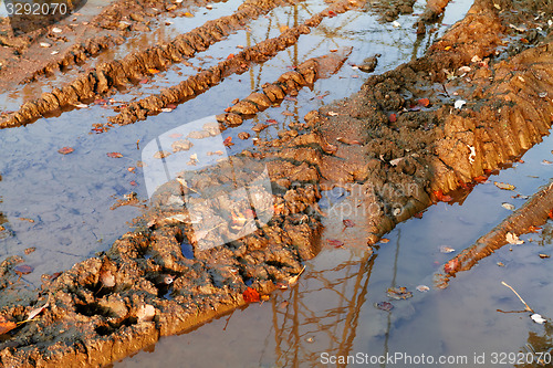 Image of Dirty broken rural road 